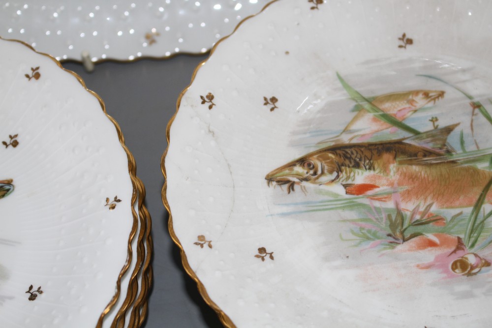 A Limoges thirteen piece porcelain fish service, printed with pike and other freshwater fish